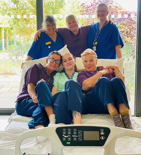 Inpatient Unit staff on one of the new cuddle beds