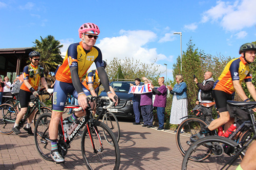 Bristol to Paris cyclists leaving the Hospice