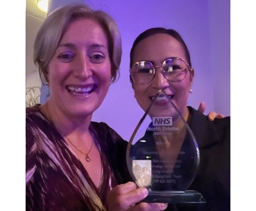 Staff collecting the Outstanding Collaboration Award