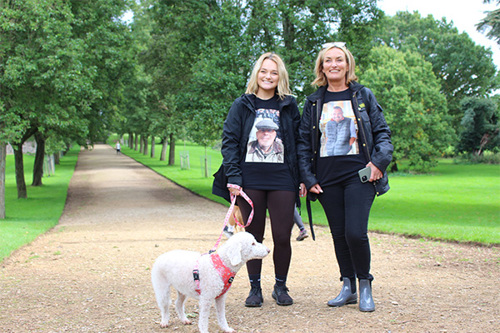 Two women with their dog at Walk to Remember
