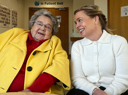 Pat with a member of the Wellbeing team