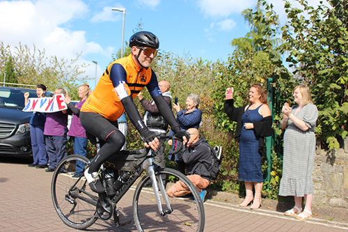 Bristol to Paris cyclists leaving the Hospice